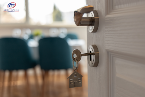 key inside door to new house of homeowner after mortgage loan agreement