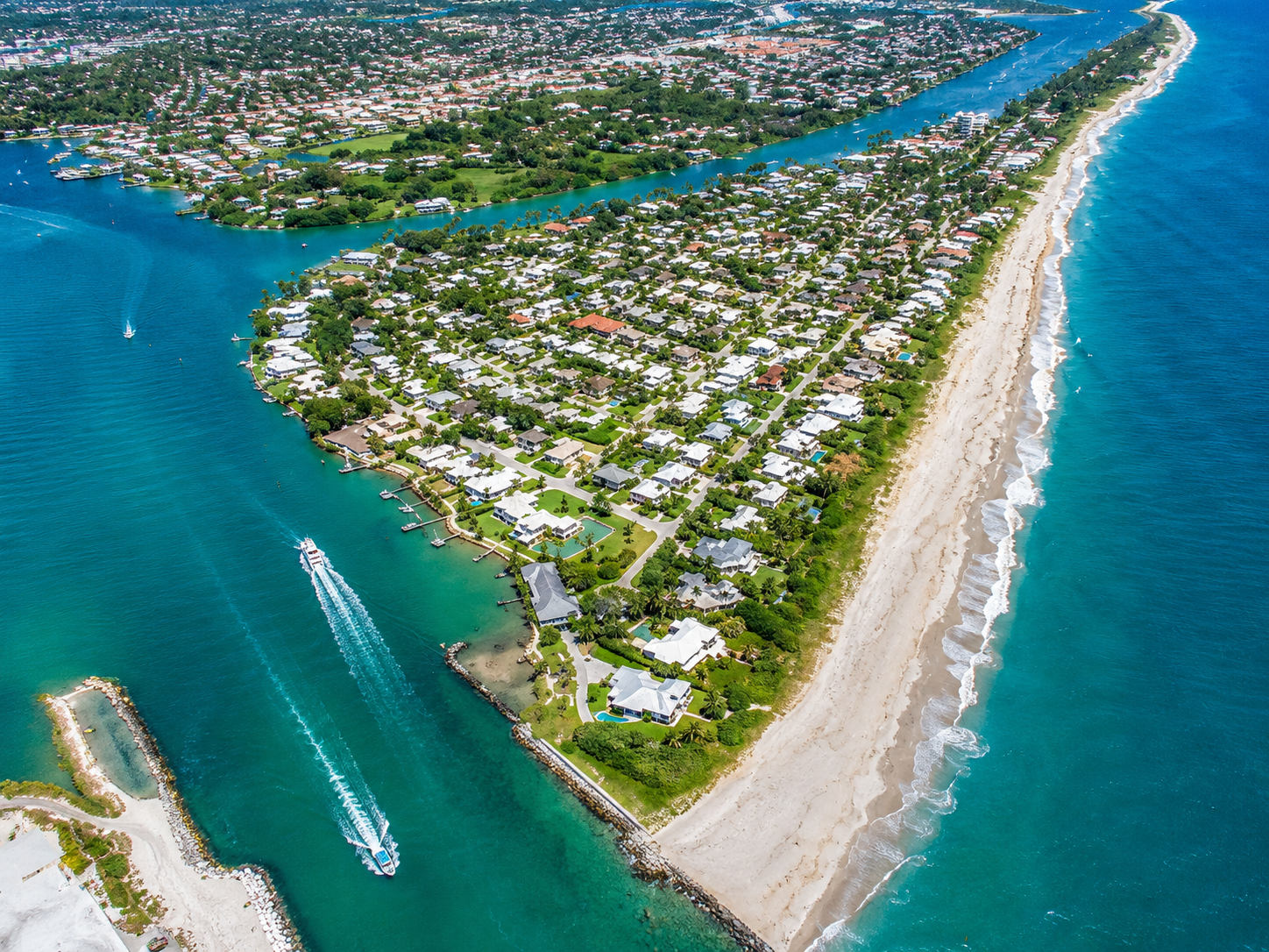 Jupiter Inlet Colony Florida aerial view between the Atlantic Ocean and surrounding waterways