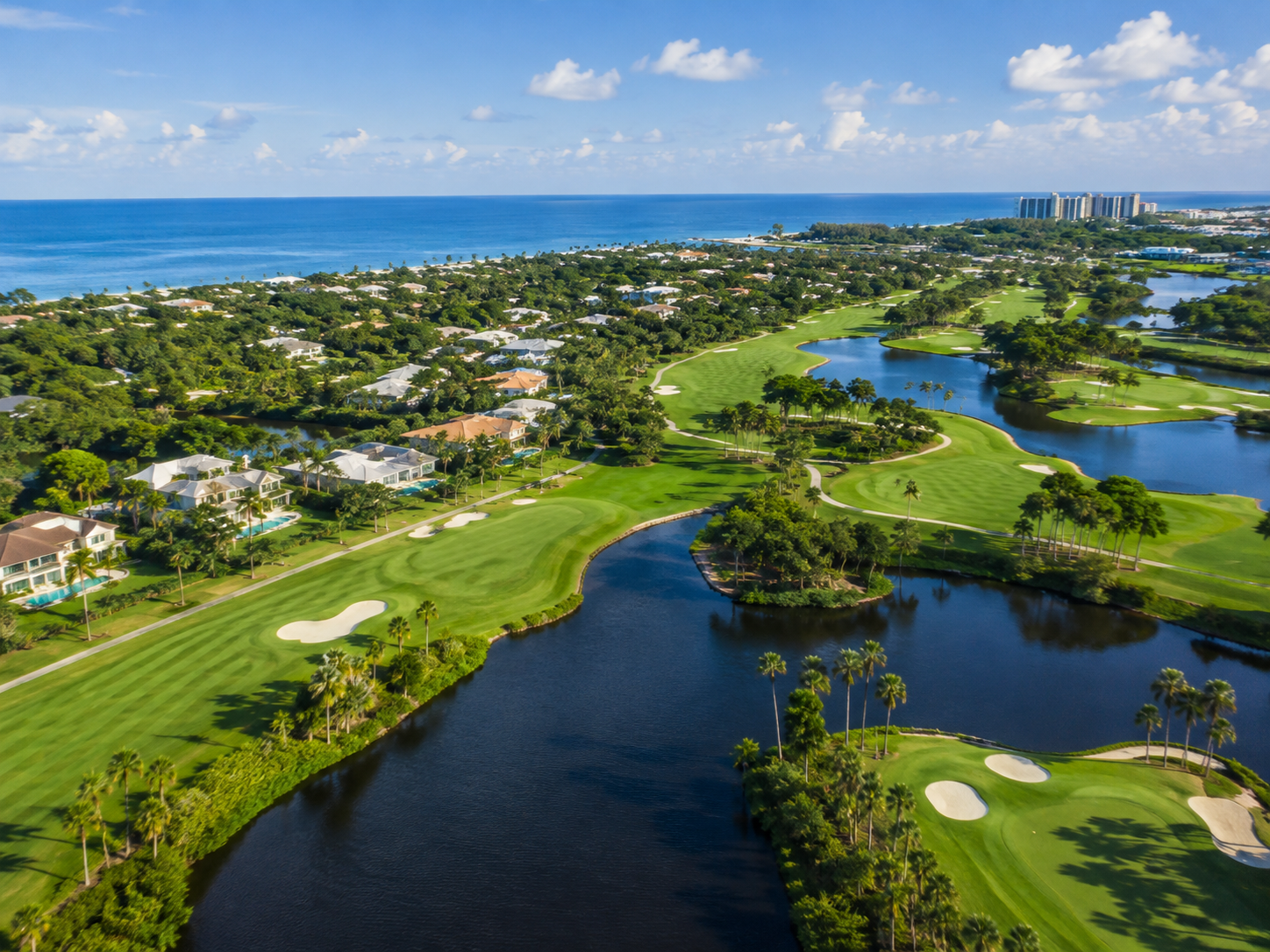 Aerial view of a Jupiter golf community near the Atlantic Ocean